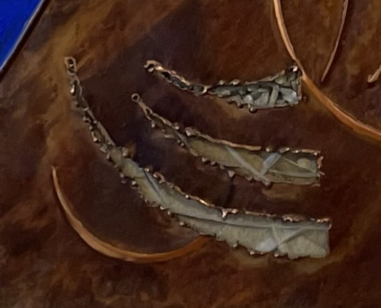 Particolare: Le tre terre.